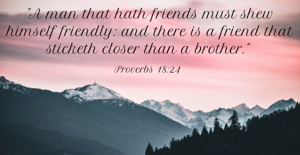 Proverbs 18:24 written in black letters in a pink sky over dark mountains